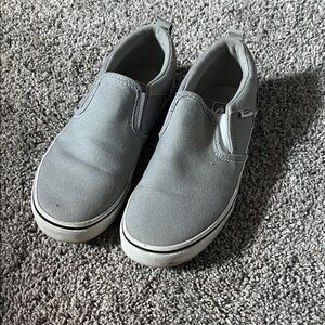 Vans Gray Slip-On Sneakers with checkered bottoms